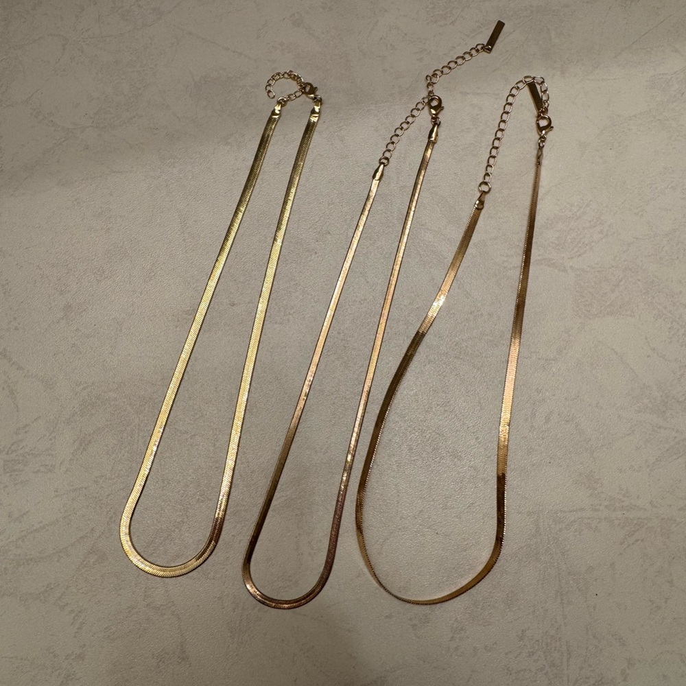 Dynamite stacking necklaces